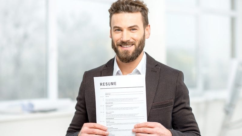 Man with resume paper