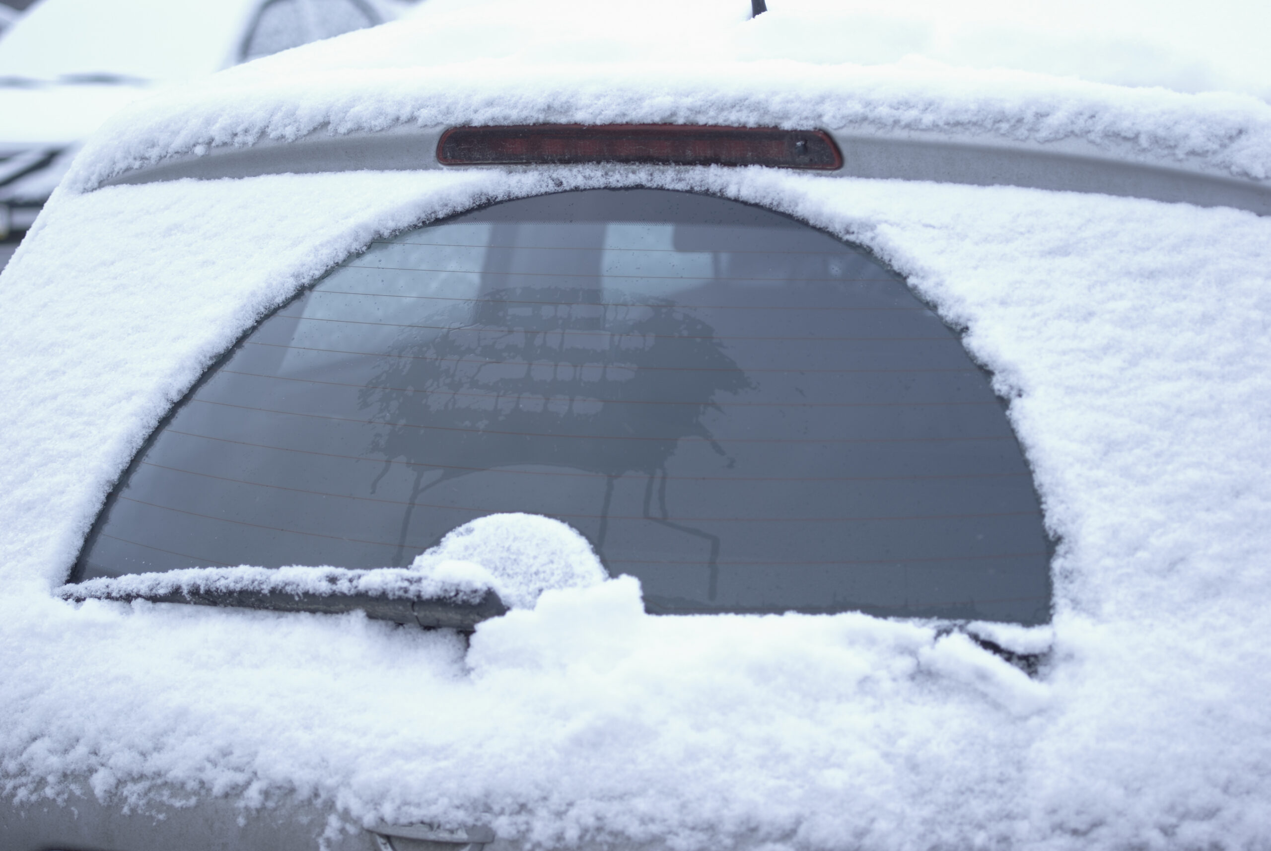 Frozen car. Snow and ice on the car.