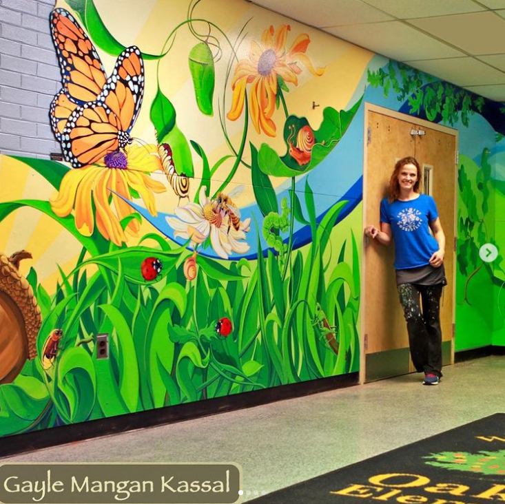 School mural featuring nature and butterflies