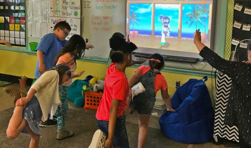 kids doing GoNoodle activity, as an example of indoor recess ideas