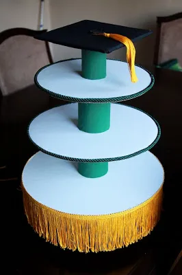 DIY cupcake stand with graduation cap on top.