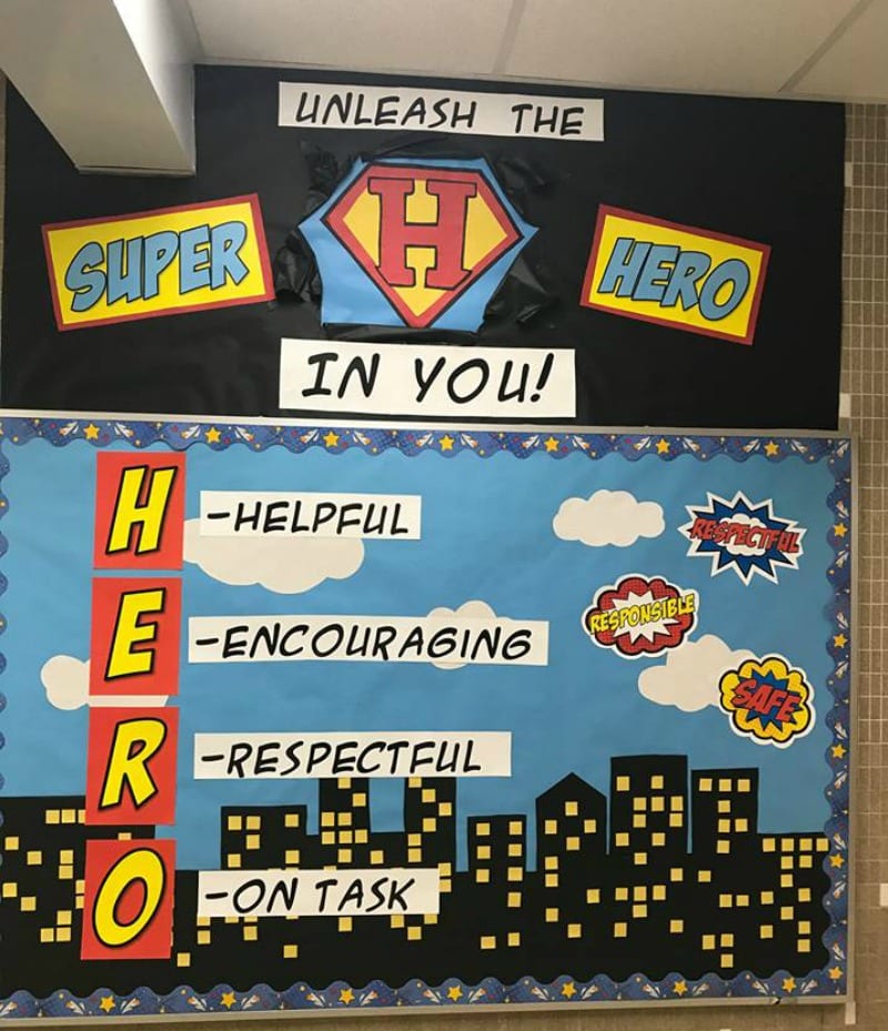 HERO bulletin board with a superhero theme. Hero stands for Helpful, Encouraging, Respectful, On-Task.