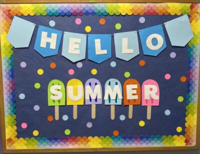 Bulletin Board with colorful dots on the border that says 'Hello Summer.' Each of the letters in the word summer is on top of a different colored popsicle. 