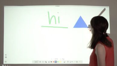 Teacher Drawing on Whiteboard - Tips to Help Teachers With Tech