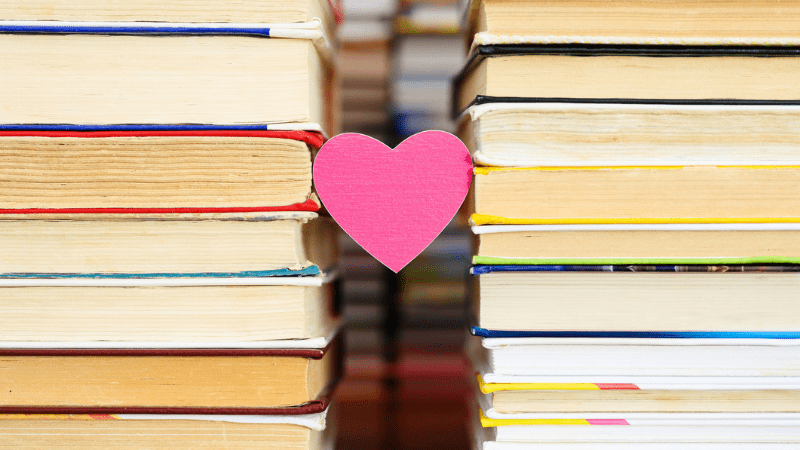 Heart between two stacks of books