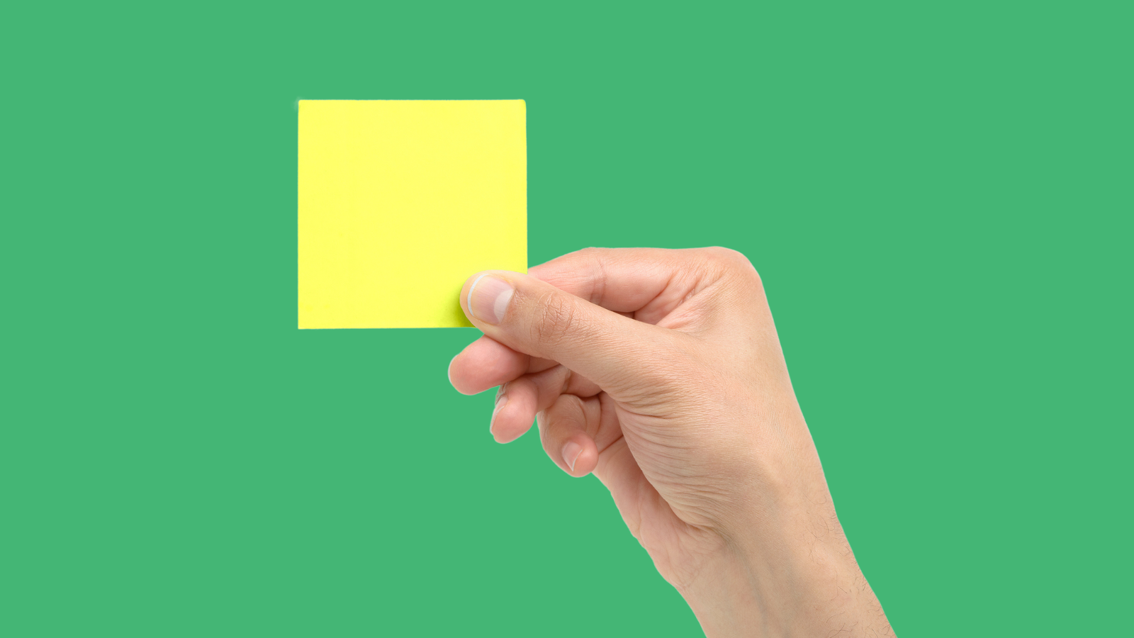 Photo of teacher holding a yellow card