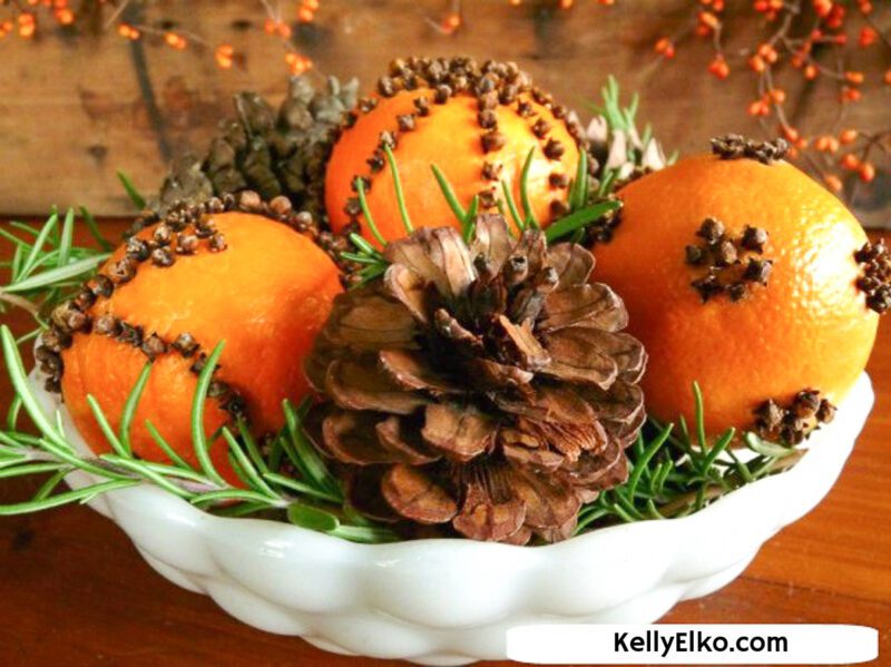 A display of orange pomaders in a bowl