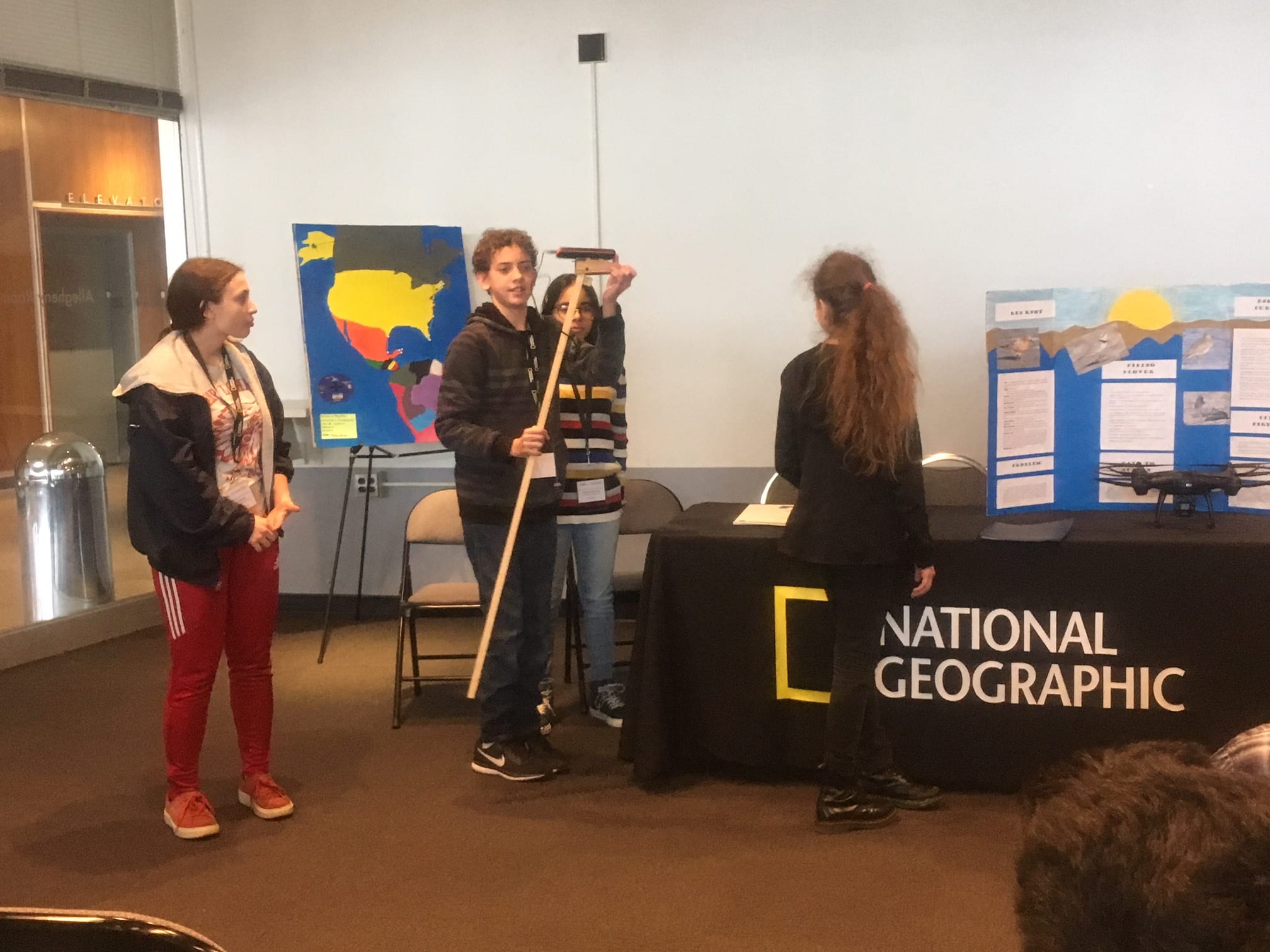 students showing their GeoChallenge project - STEAM Skills