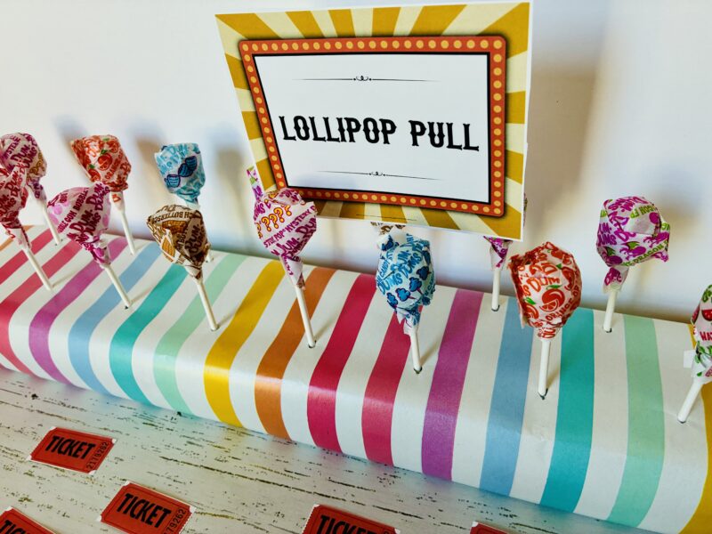 Carnival Games a carnival game for kids: lollipop pull