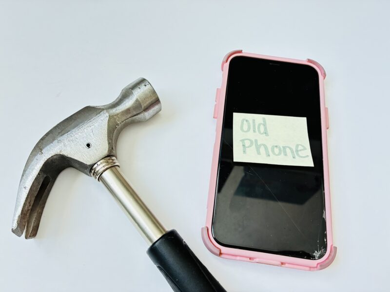 April Fools Jokes for Teachers to Play on Students an image of an old phone and a hammer to show teachers a April fools' day prank