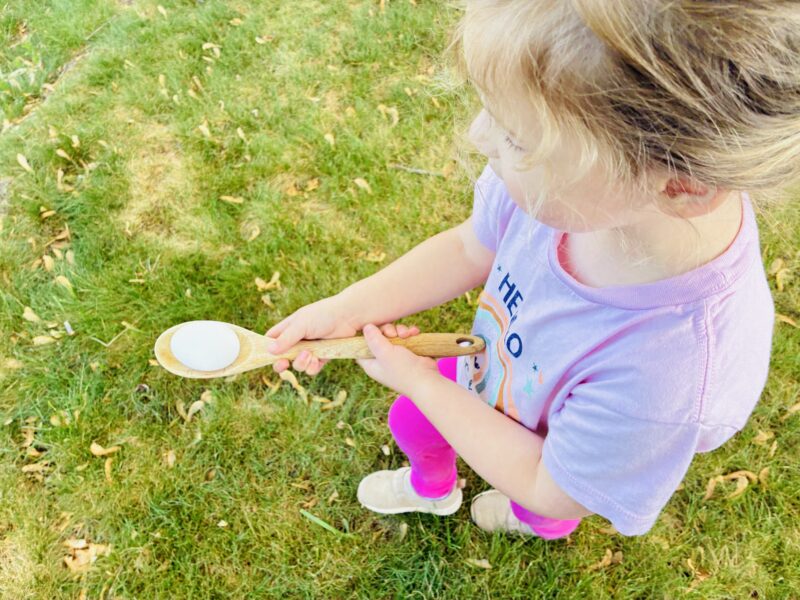 an image of a fine motor activity where students participate in a spoon and egg race