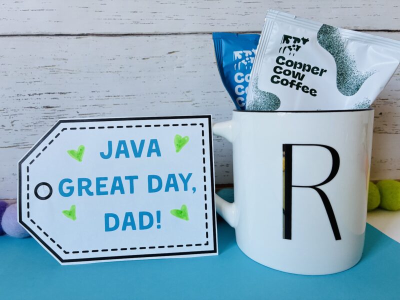 a Father's Day present that has a mug, coffee and gift tag