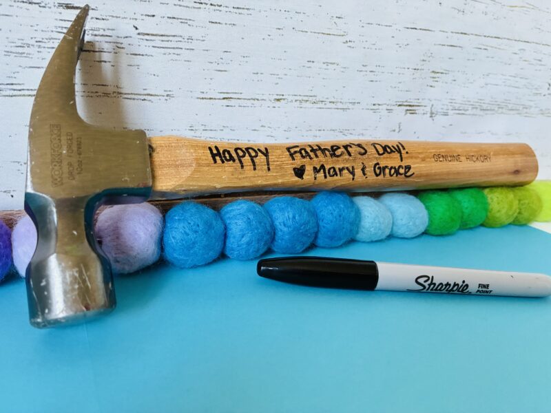 A Father's Day message written on a hammer