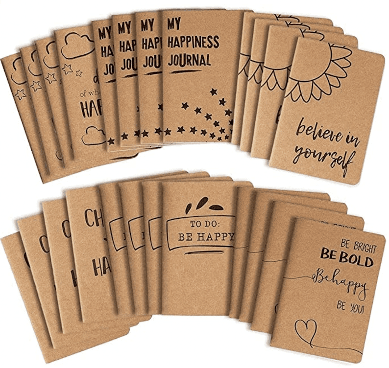 A set of brown paper journals with happiness saying, as an example of graduation gifts for high school seniors from teachers