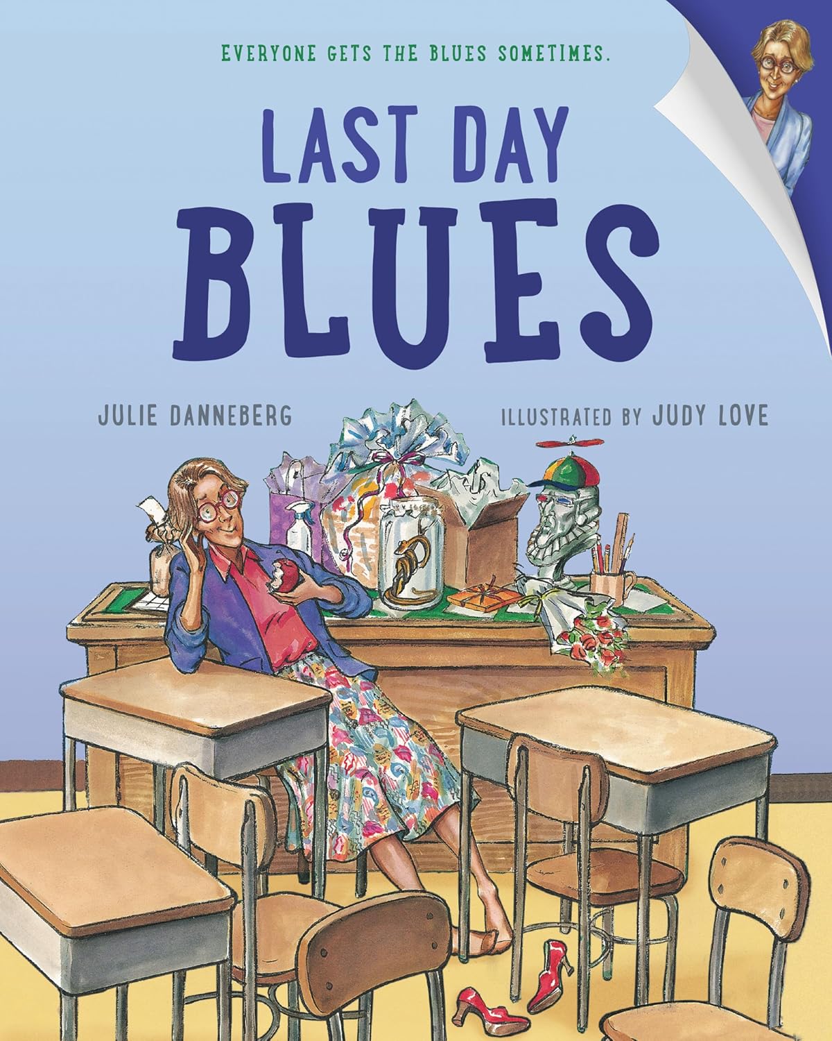 Last Day Blues a teacher sits in an empty classroom- summer picture books for kids