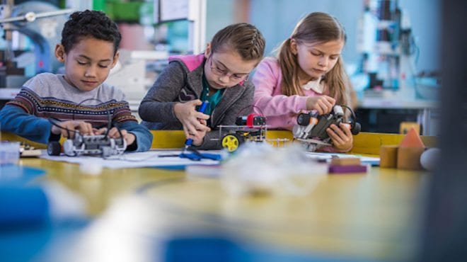Children working in a classroom makerspace