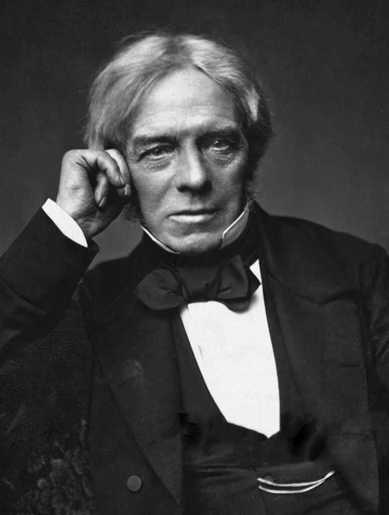 Famous engineers include Michael Faraday seen here in an old black and white photo and tux. 