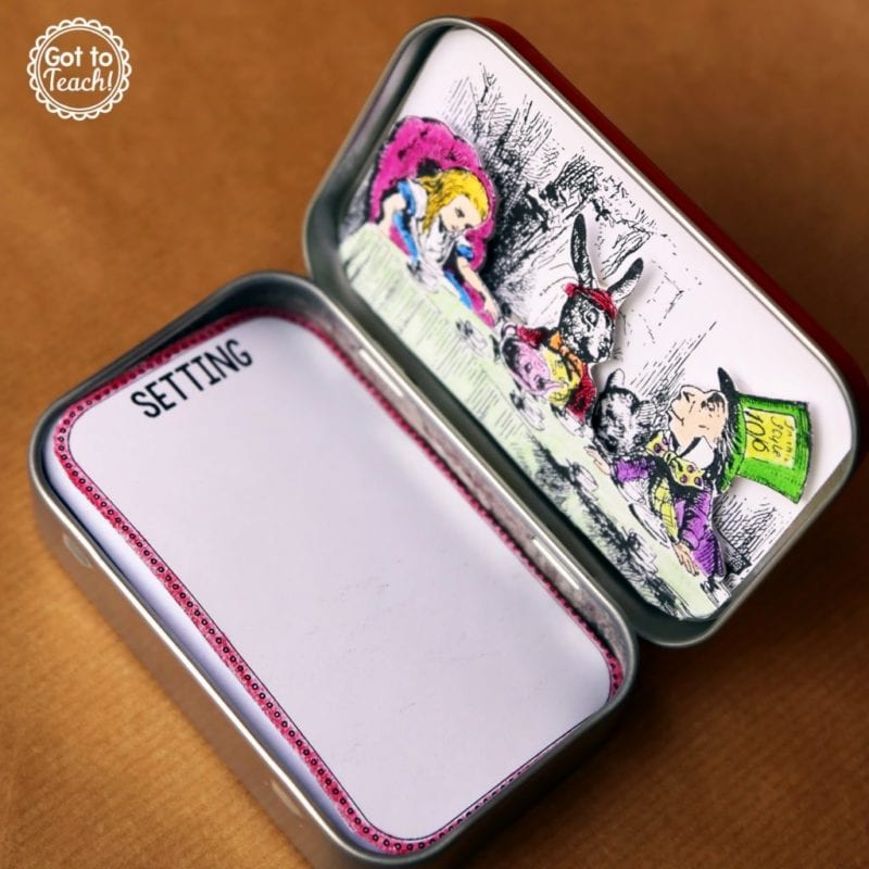 a mint tin with an illustration from Alice in Wonderland on the inside of the top and labelled notecards inside