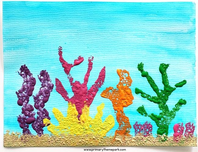underwater plant life has been painted in bright colors on a canvas. 