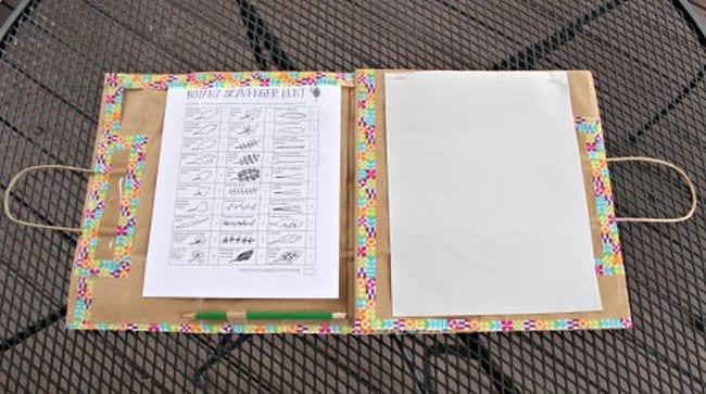 Outdoor science activities can include journaling like this nature journal made from a paper bag with checklist, blank pages, and pencil 