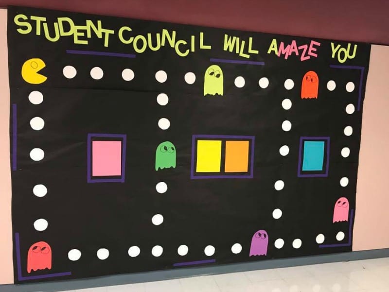 Pac-man themed bulletin board reading Student Council will amaze you!