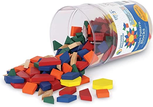 Wooden colorful pattern blocks in can