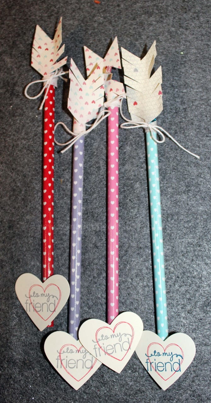 Four pencils with polkadots that look like arrows with heart-shaped cards that say, "to my friend"