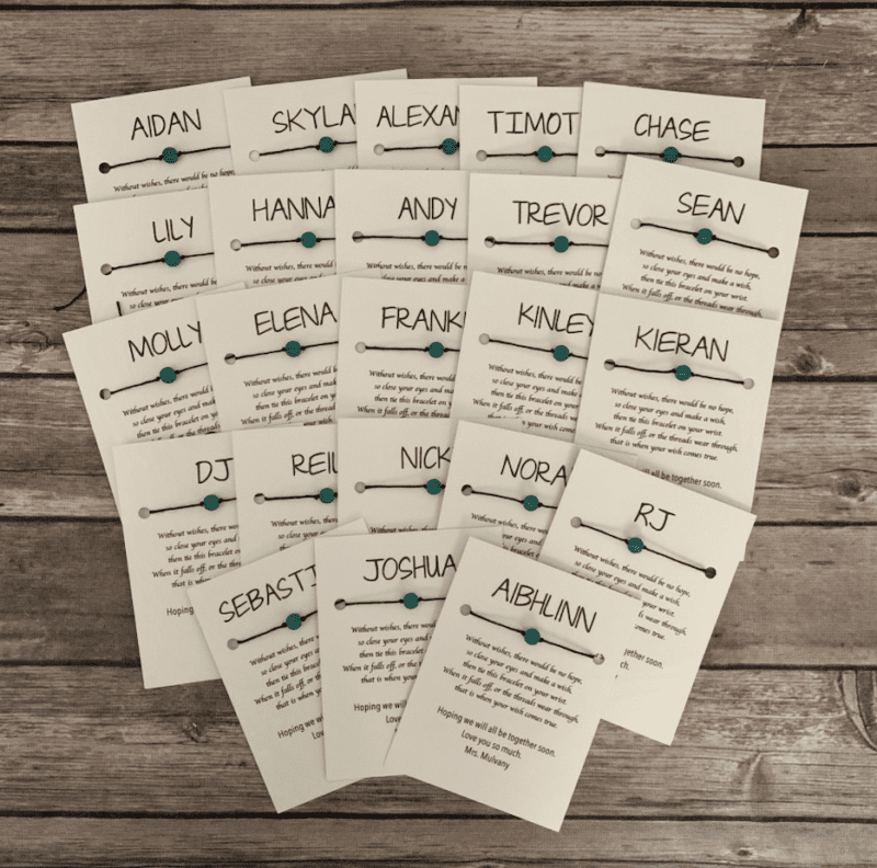 A set of personalized bracelets for teachers to give seniors for graduation.