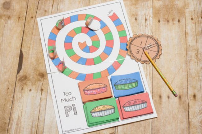 Pi Day printable board game with multicolored game spaces arranged in a spiral, a homemade spinner and four stacks of colored pie cards Pi Day Activities