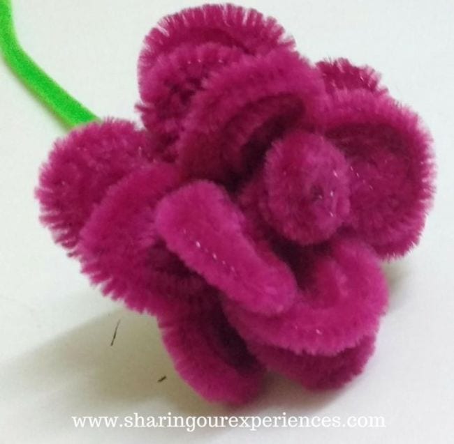 Pipe cleaner crafts include this rose made from dark pink pipe cleaners.