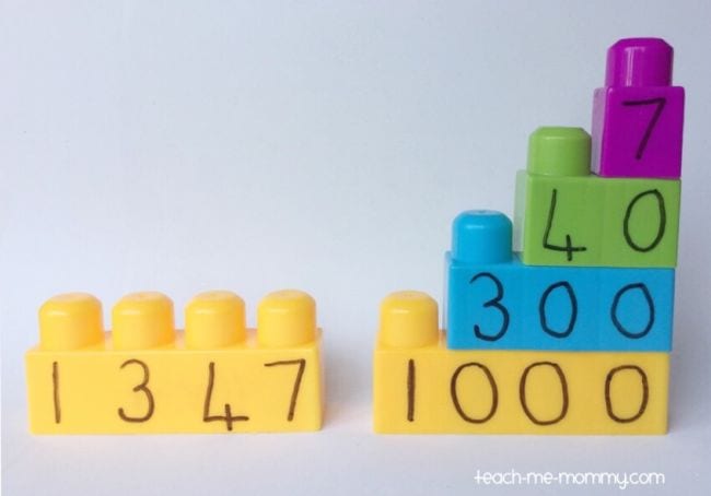LEGO DUPLO bricks with numbers written on the sides under each peg (Place Value Activities)