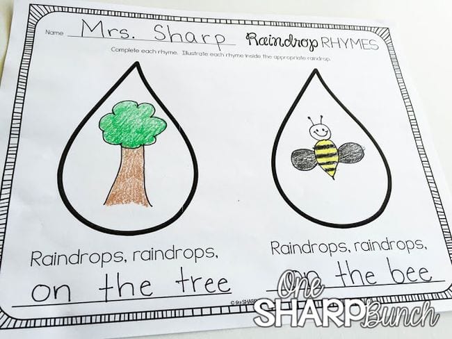 Raindrop Rhymes worksheet showing two large raindrops with pictures drawn in them and rhyming lines (Poetry Games and Activities)
