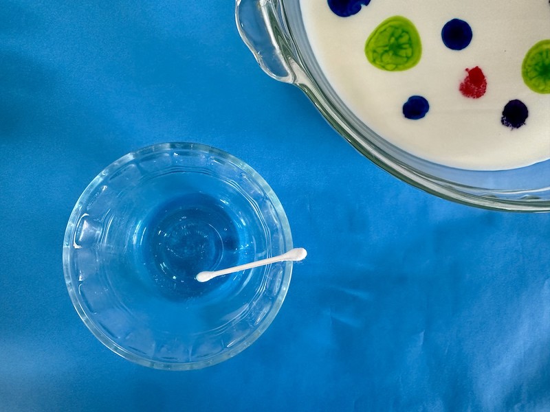 Q tip dipped into dish soap