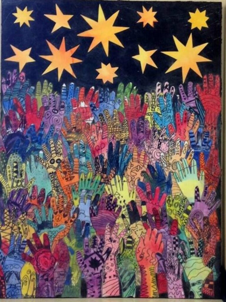 A beautiful collage made by children of arms reaching up to a sky of bright stars