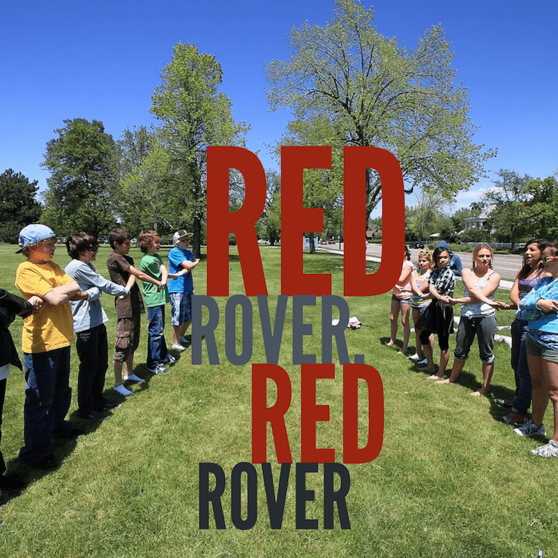 Two long lines of students are facing eachother about 8 feet apart. The students in each line have their arms crossed and are holding hands. The Words Red Rover, Red Rover are printed on the image.