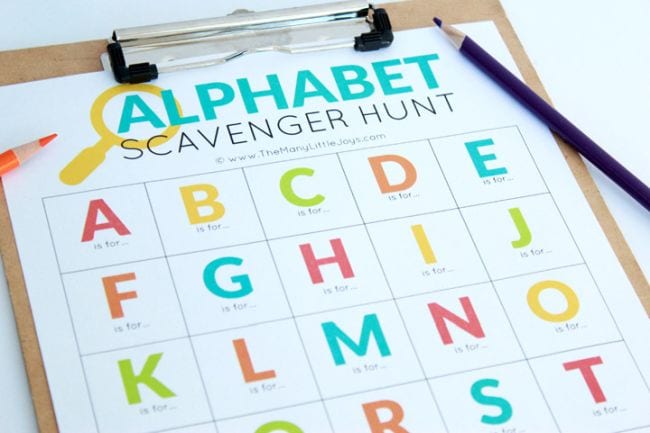 Alphabet scavenger hunt printable on a clipboard with a pencil