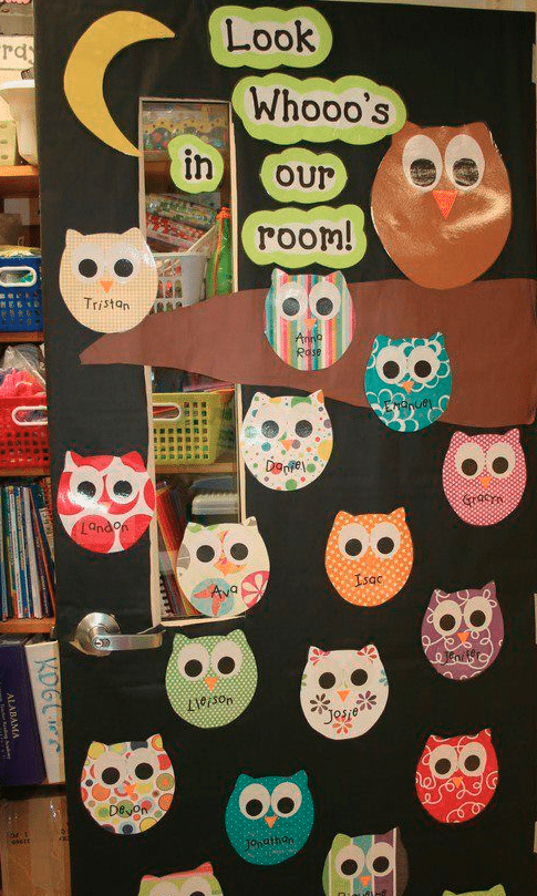 Door decoration of owls labelled with names of students and the words "look whooo's in our room!" -- classroom doors