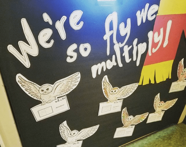 We're so fly we multiply! Bulletin board with print outs of owls