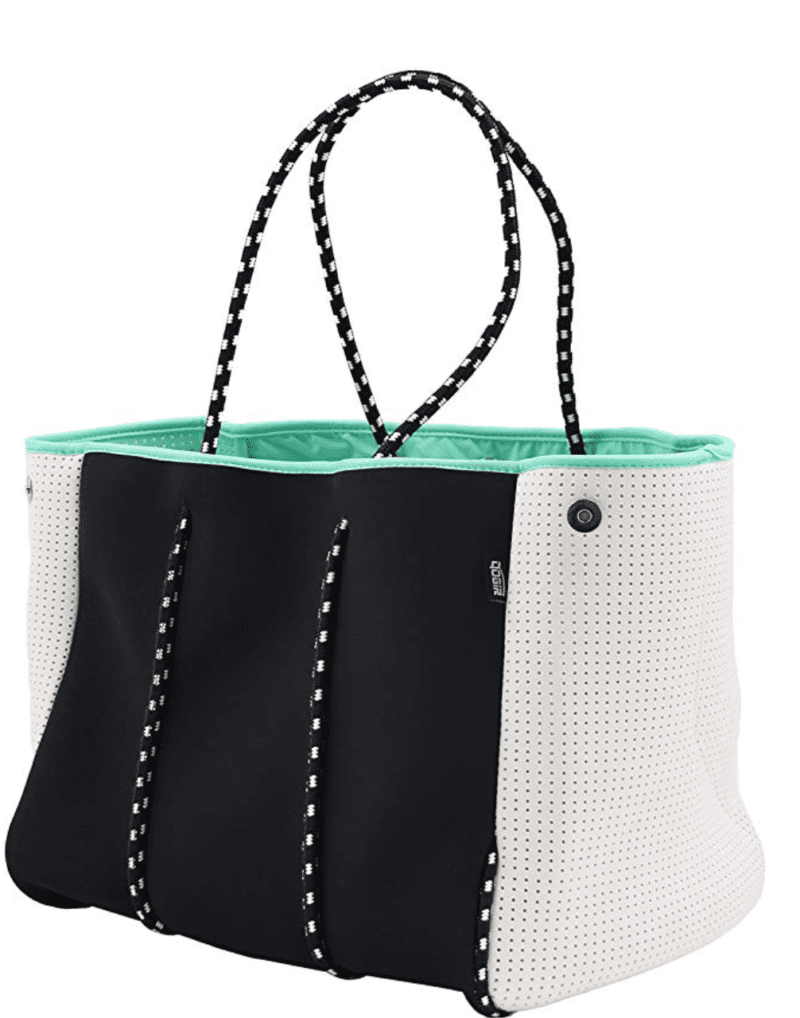 Large boxy bag with black and white exterior, aqua lining, and braided black and white straps (Best Teacher Bags)