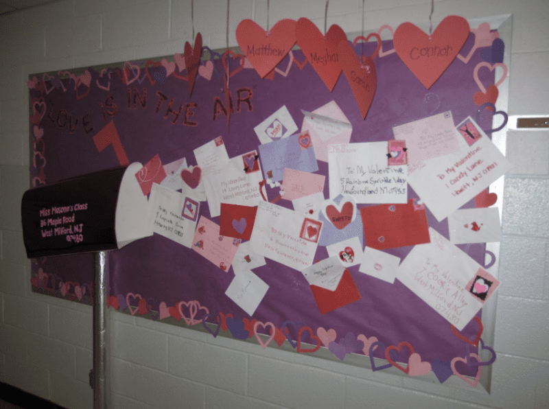 Bulletin board with cutouts of letters and hearts