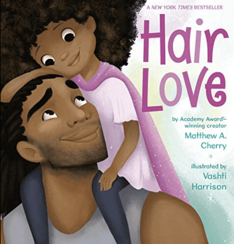 Cover of Hair Love by Matthew A. Cherry. A Black father looking up to his black daughter who is wearing a pink outfit and has big curly hair- Black Children’s Book Authors
