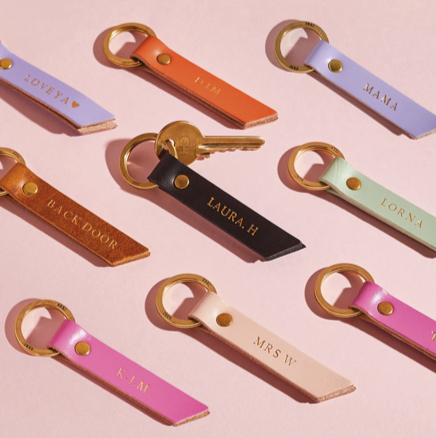 Different colored key chains with names on them