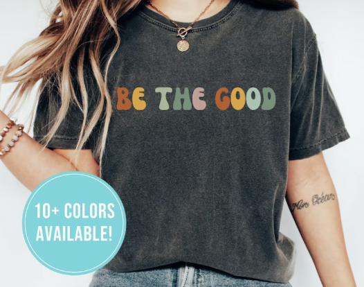 Shirt with words Be the Good in colorful retro letters