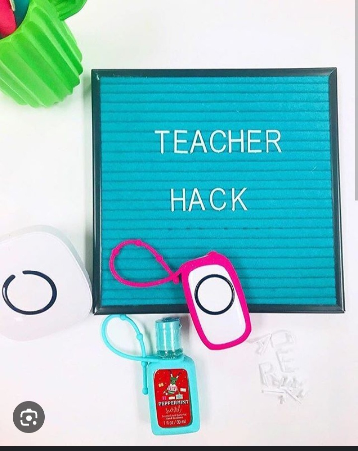 A board says Teacher Hack and has a wireless doorbell on it.