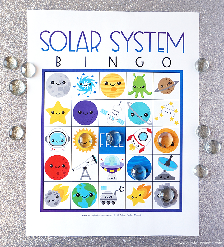 A bingo card says solar system bingo across the top. It has pictures of various things from space on it.