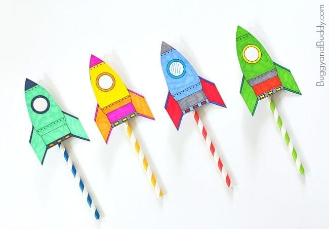 space activities for kids- 4 colorful paper rockets attached to striped drinking straws