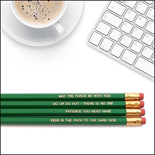 Green Star Wars pencils on desk with keyboard and coffee cup.