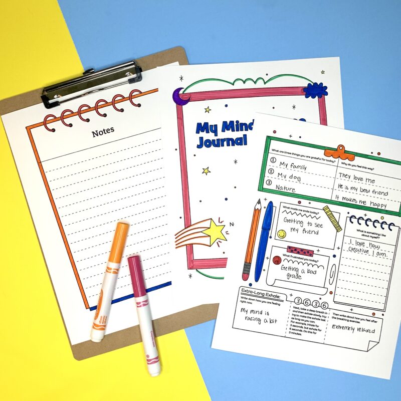 Collage of mindfulness journal pages, with one on a clipboard and a few markers