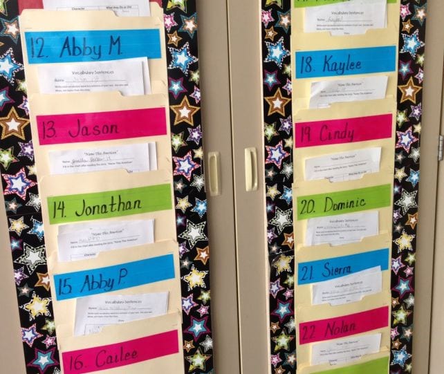 Manila file folders hanging on door for student mailbox classroom idea