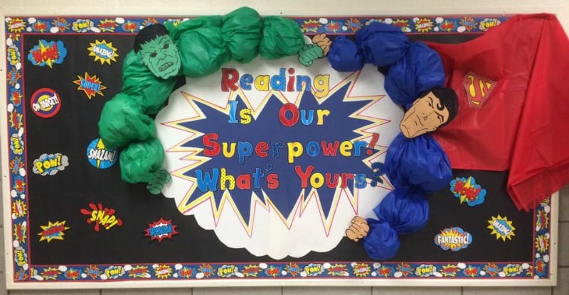 Reading is our Super Power bulletin board, with 3-D Incredible Hulk and Superman